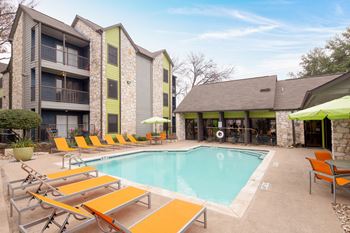 Pool Side Relaxing Area With Sundeck at The Ivy, Austin, TX